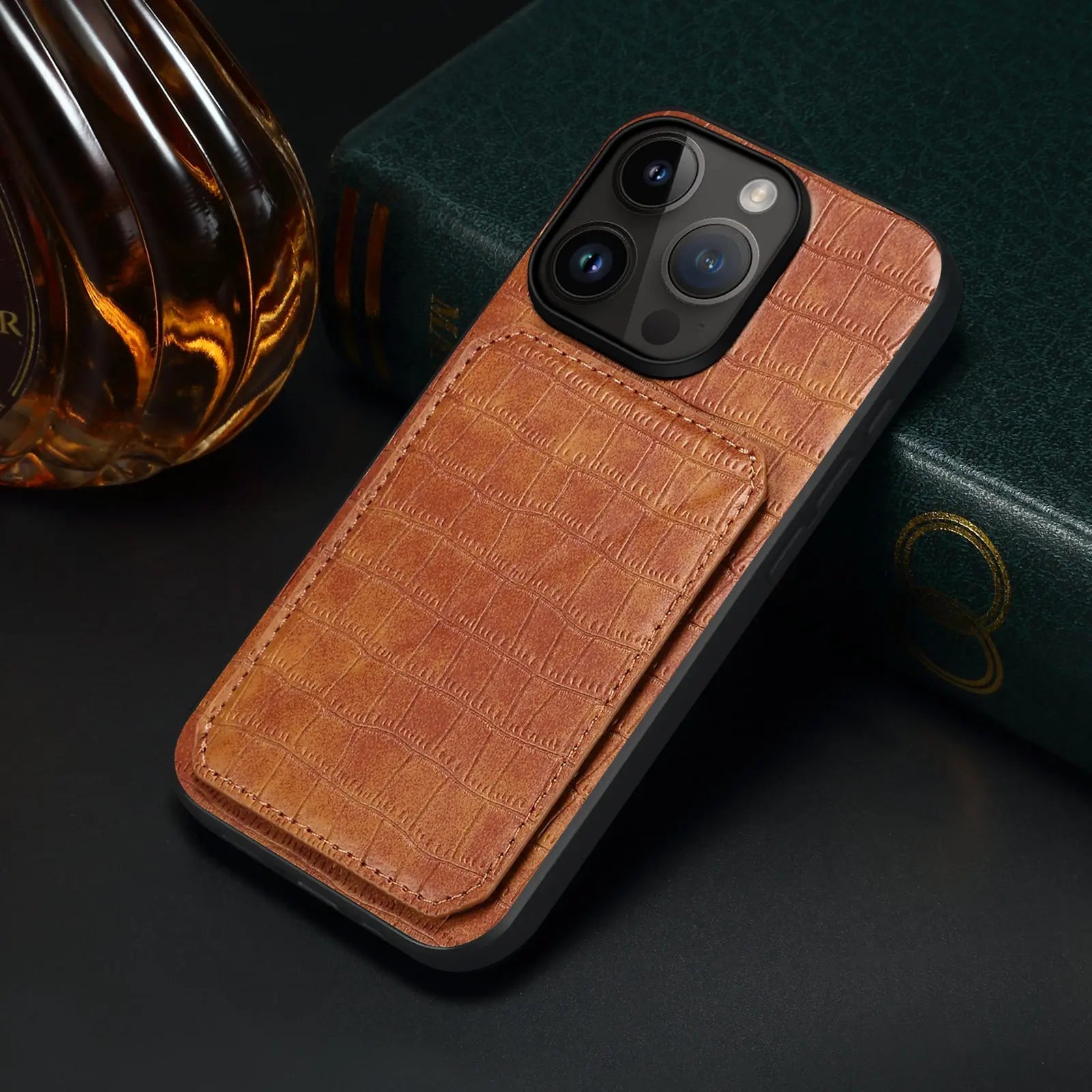 Brown PADUCASE iPhone wallet case with card holder, showing sleek design and multiple card slots on the back.