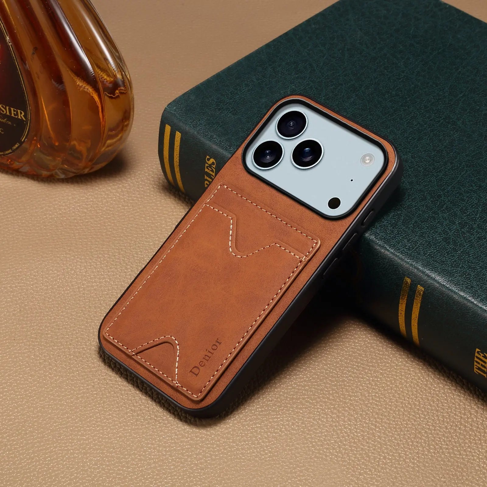 Brown leather iPhone case with card holder and foldable stand for iPhone 12-17 by PADUCASE, showing the case’s textured surface and stand feature.