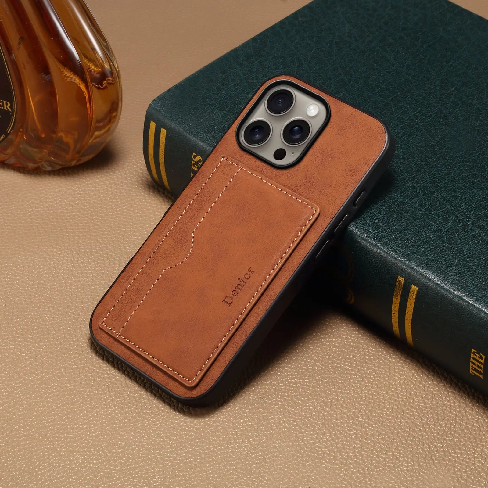 Brown leather wallet iPhone case by PADUCASE with full protective cover and card slots, shown with open features.