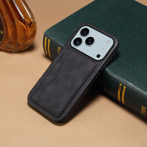 Black leather iPhone case with integrated card holder by PADUCASE, compatible with iPhone 12 to 17 models, featuring a sleek design.