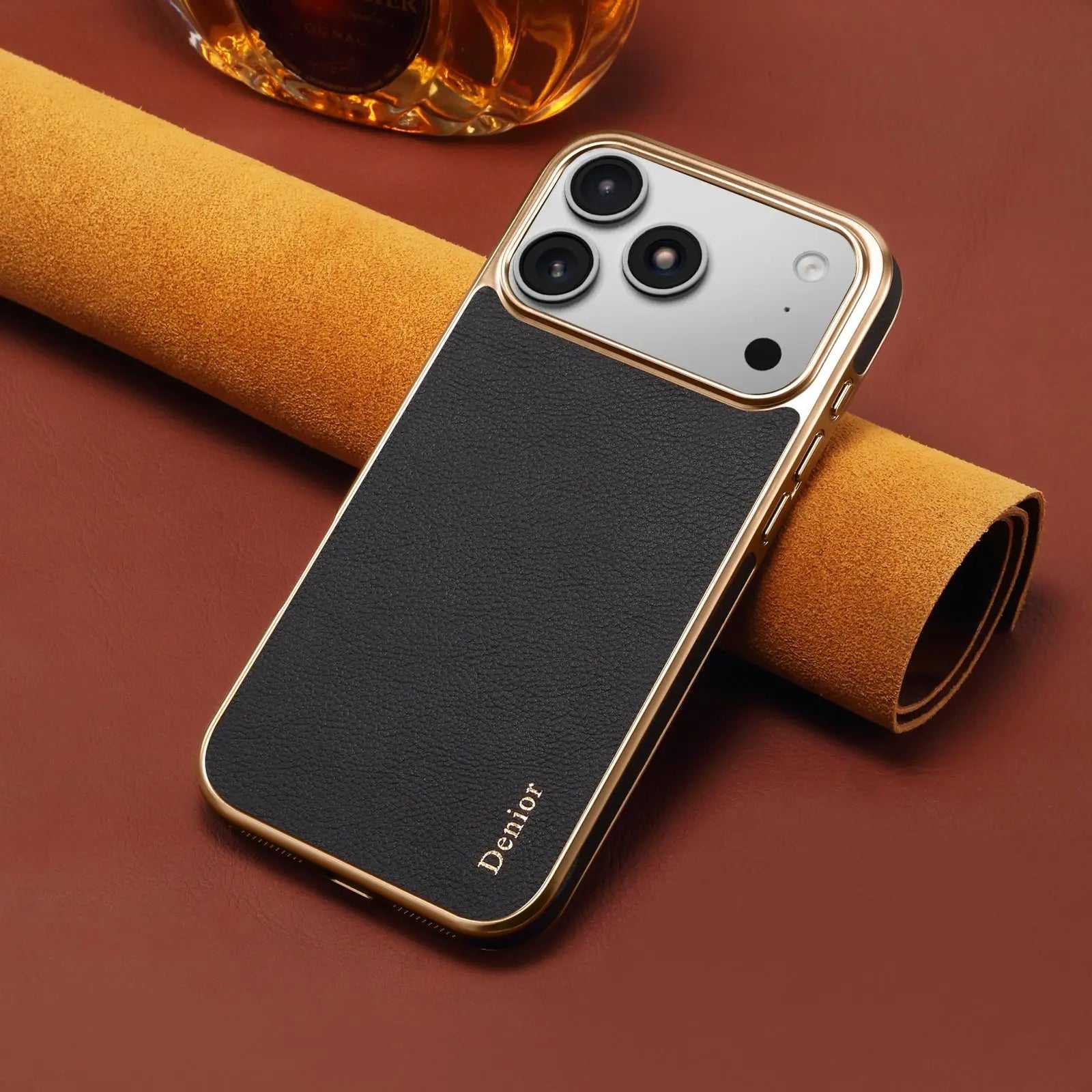 Black luxury leather iPhone case by PADUCASE with sleek, slim design, showing the textured leather surface and precise cutouts.