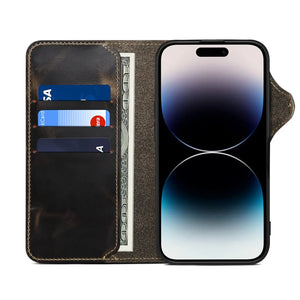 Black leather iPhone case with flip wallet design and card holder by PADUCASE, showing front view with card slots visible.
