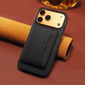 Black leather MagSafe cardholder iPhone case by PADUCASE for iPhone 12 to 17, featuring a slim design with card slots.