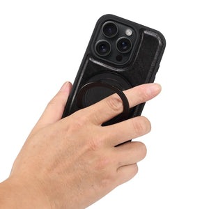 Black leather MagSafe iPhone case with integrated ring stand from PADUCASE, showing the sleek design and ring stand feature.