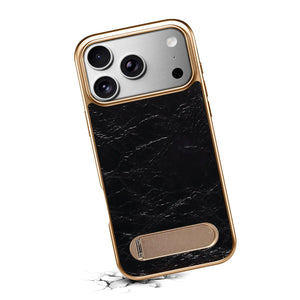 Black leather iPhone case by PADUCASE with foldable stand and MagSafe compatibility, featuring sleek design and precise cutouts.