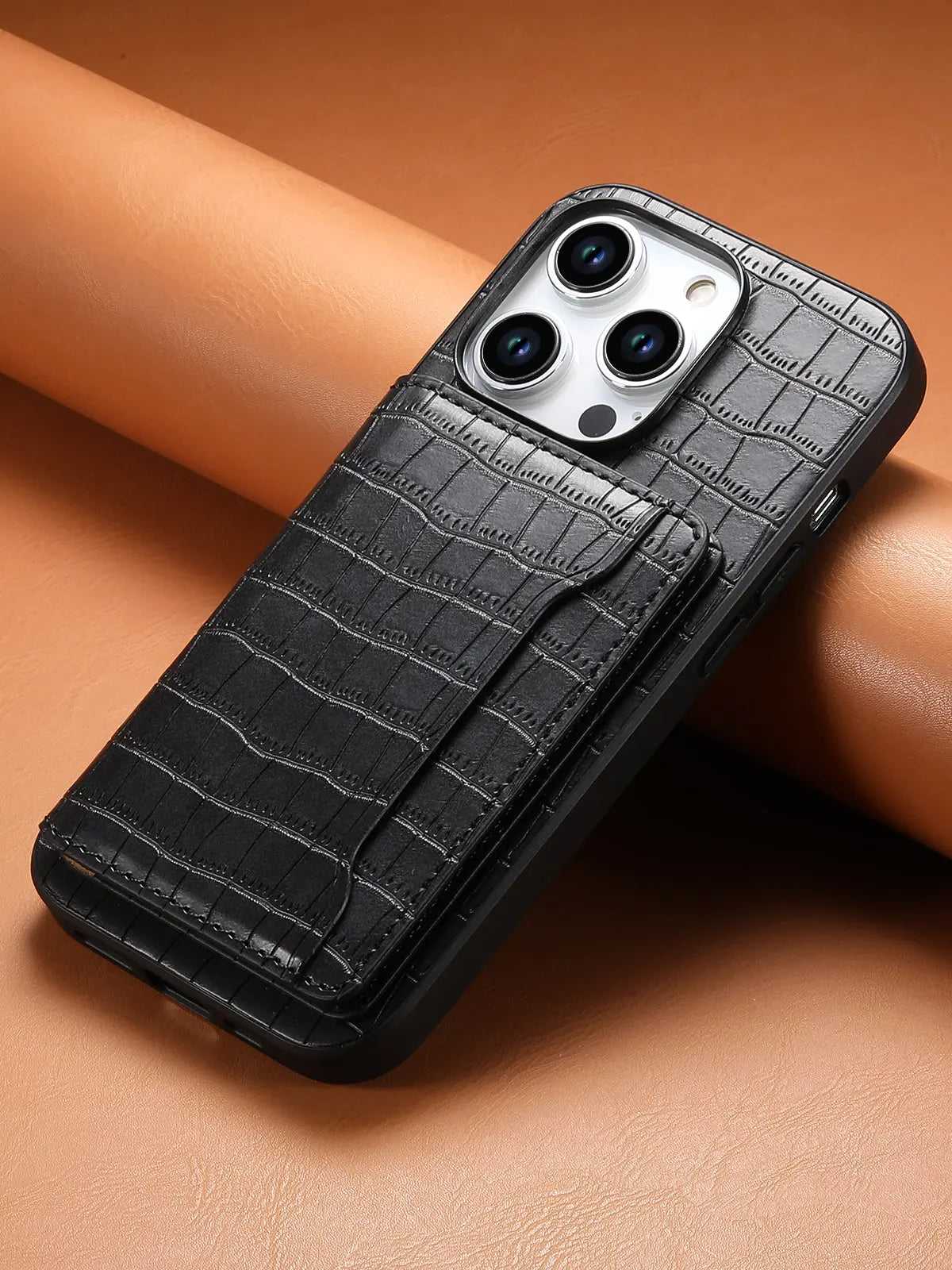Black leather wallet iPhone case by PADUCASE, slim design with card slots and protective phone cover in a sleek, stylish look.