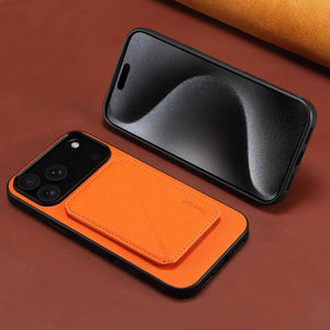Orange leather MagSafe iPhone case with hidden card slot, durable protective cover by PADUCASE, showing front view with card slot detail.