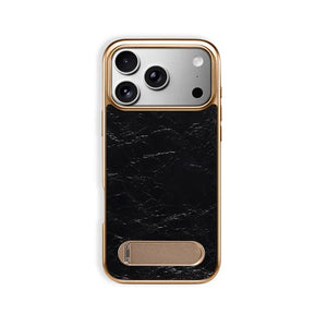 Black leather iPhone case with foldable stand for MagSafe compatibility, featuring PADUCASE branding and precise cutouts.