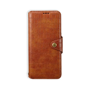 Brown leather flip iPhone case with card holder and strap by PADUCASE, showing the front view with open flip design.