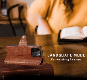 Brown leather iPhone flip case with card holder and strap by PADUCASE, showing the front view with card slots and strap attachment.