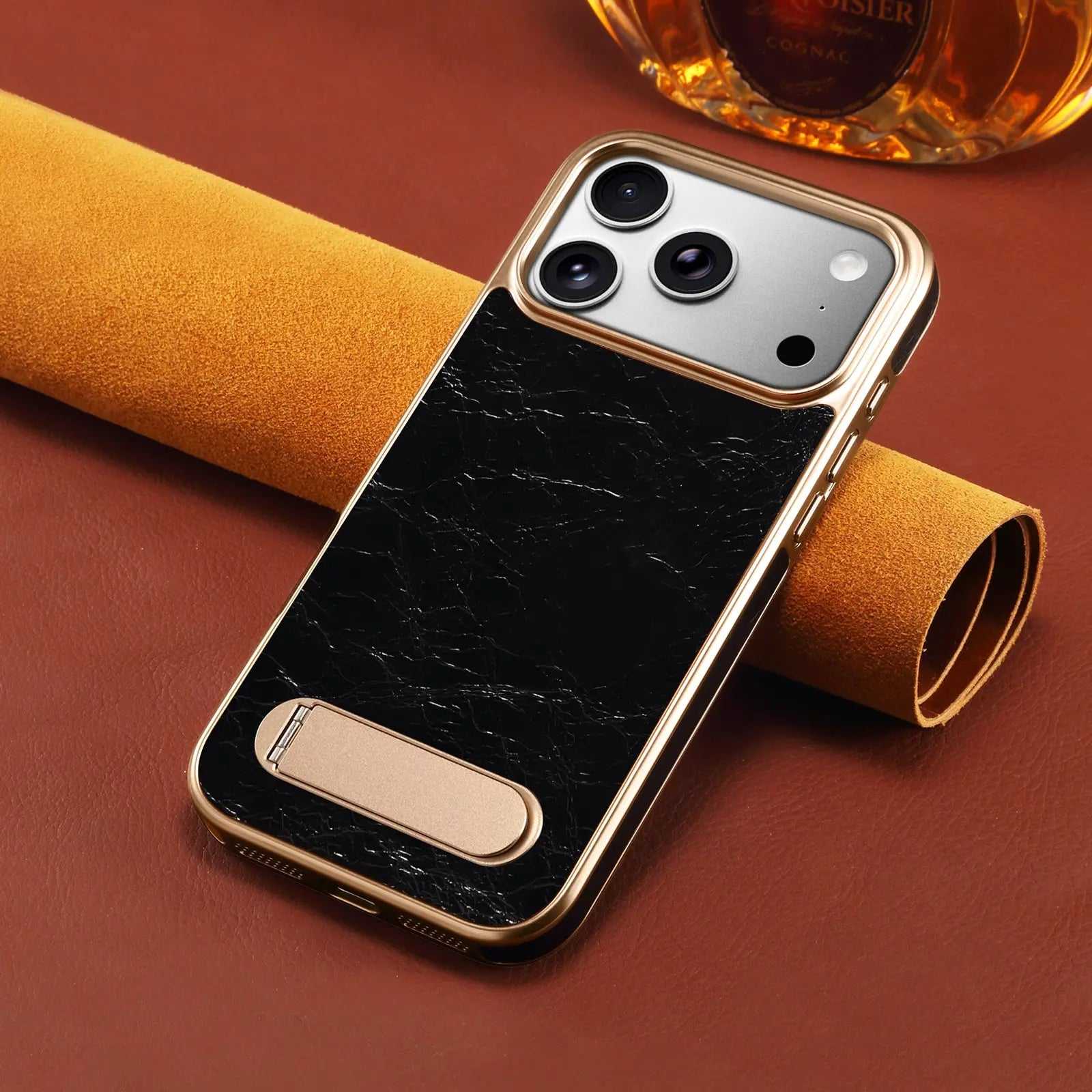 Black leather iPhone case with foldable stand and MagSafe compatibility, designed by PADUCASE for secure protection and convenience.